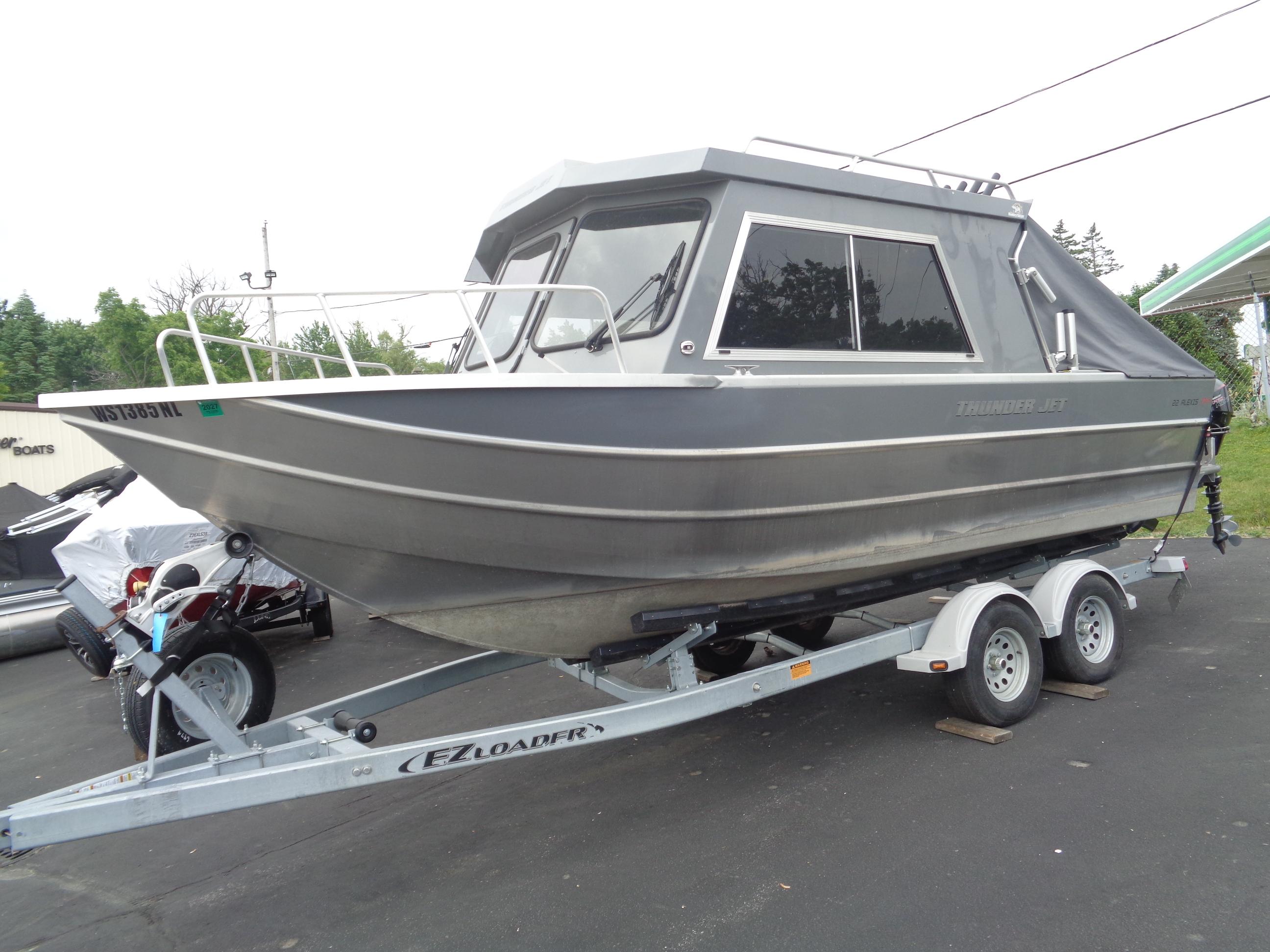 Thunder Jet 22 Alexis Pro 2022 Thunder Jet 22 Alexis Pro boat on trailer, parked outdoors.