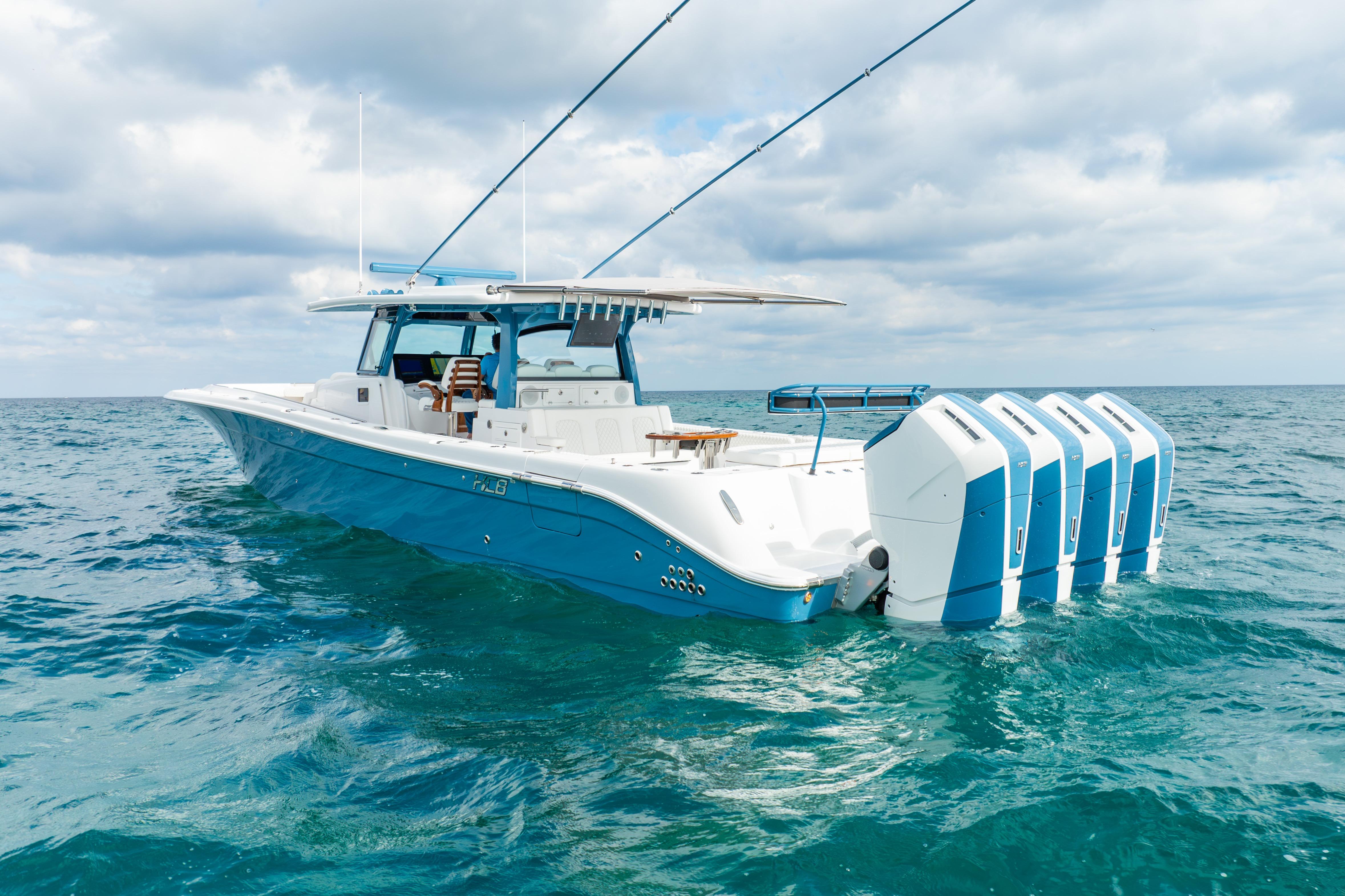 HCB 53 Suenos RXV 2026 HCB 53 Suenos RXV boat with multiple engines on open water.