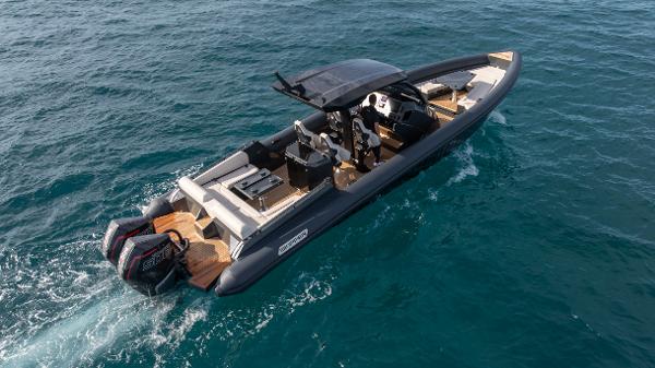 Skipper-BSK 38NC 2025 Skipper-BSK 38NC boat cruising on open water, featuring sleek design and dual engines.