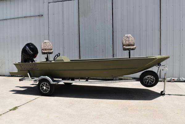 Lowe RX1860 RAMBLER 2025 Lowe RX1860 RAMBLER boat on trailer, parked outdoors.