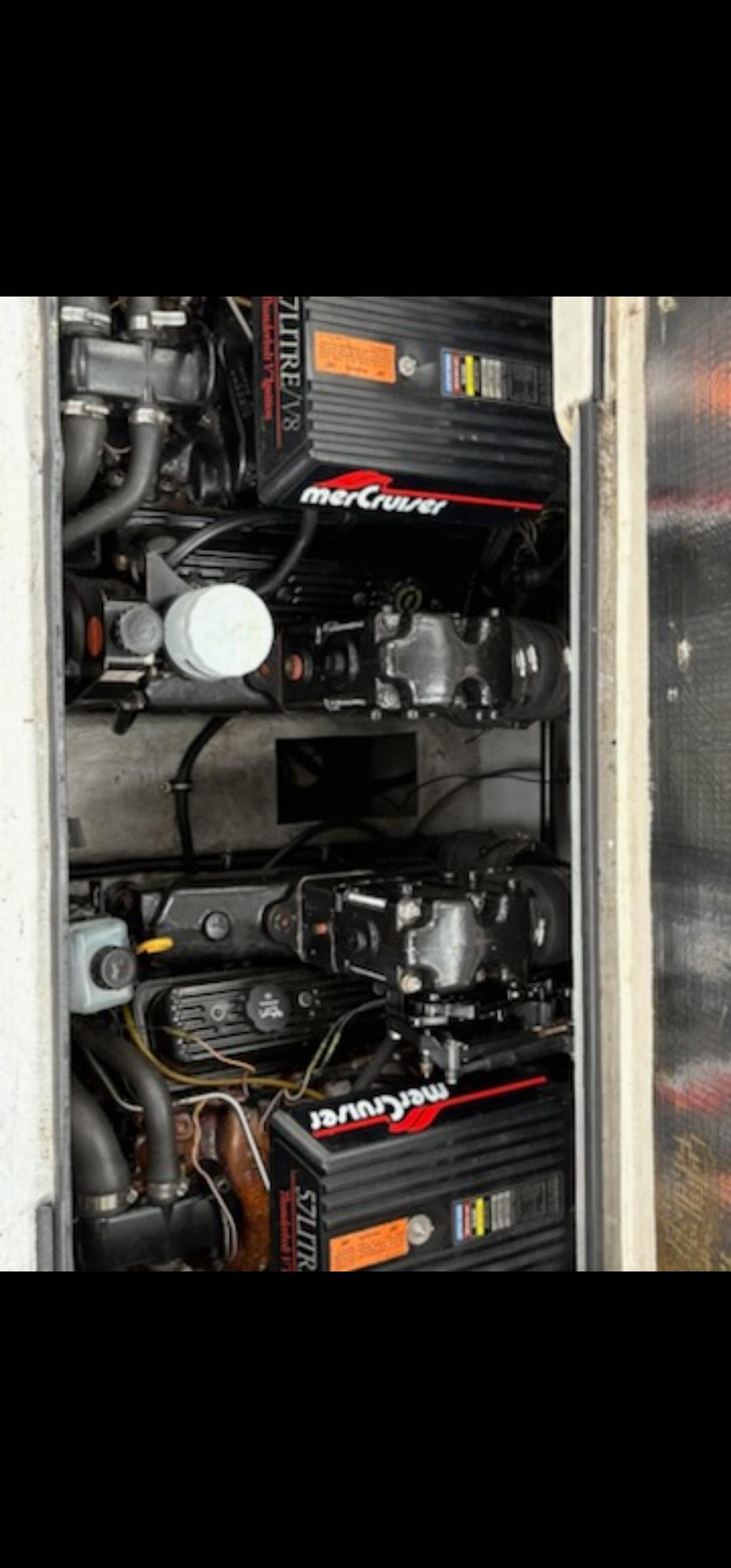 Regal 292 Engine compartment of a 1997 Regal 292 boat with MerCruiser engines.