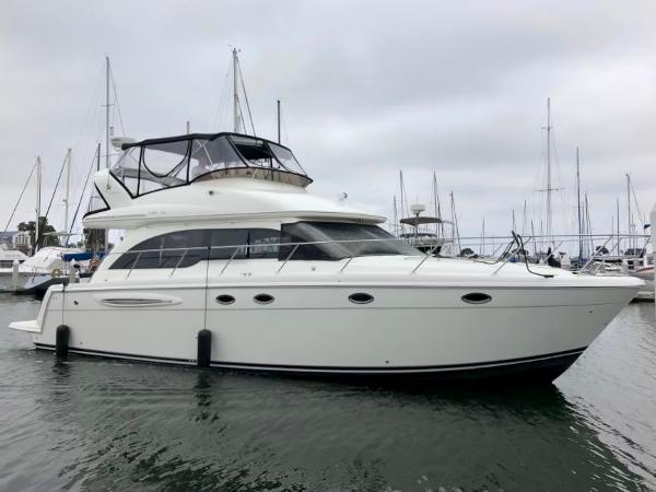 Meridian 411 Sedan 2008 Meridian 411 Sedan yacht docked in marina, featuring sleek design and spacious upper deck.