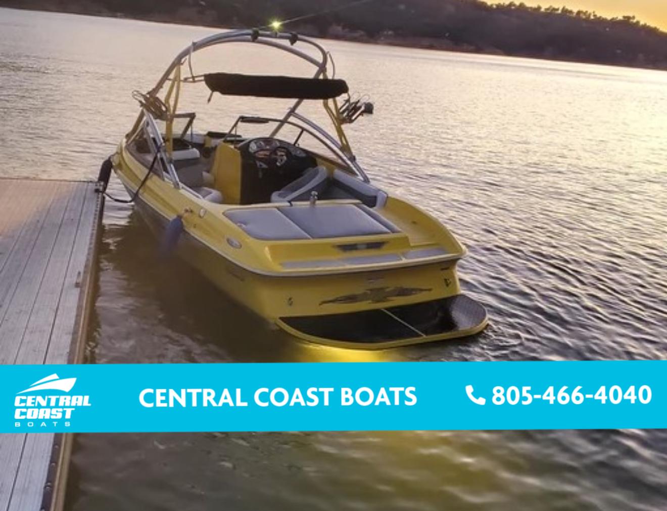 Tigé 22 VE 2006 Tigé 22 VE boat docked at sunset, Central Coast Boats contact info.