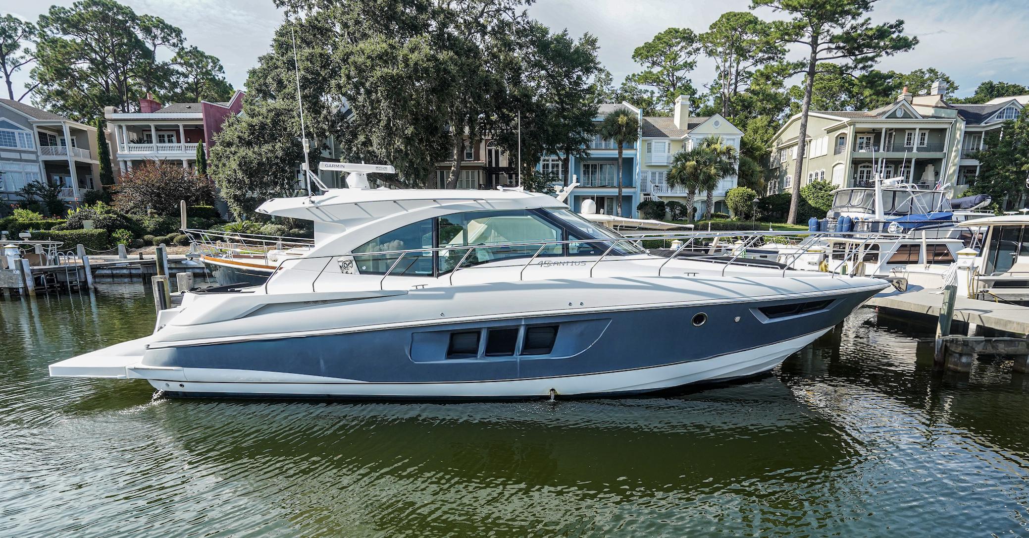 Cruisers Yachts 45 Cantius 2016 Cruisers Yachts 45 Cantius docked near waterfront homes.