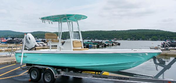 Savannah 220 IS 2023 Savannah 220 IS boat on trailer by a lake.