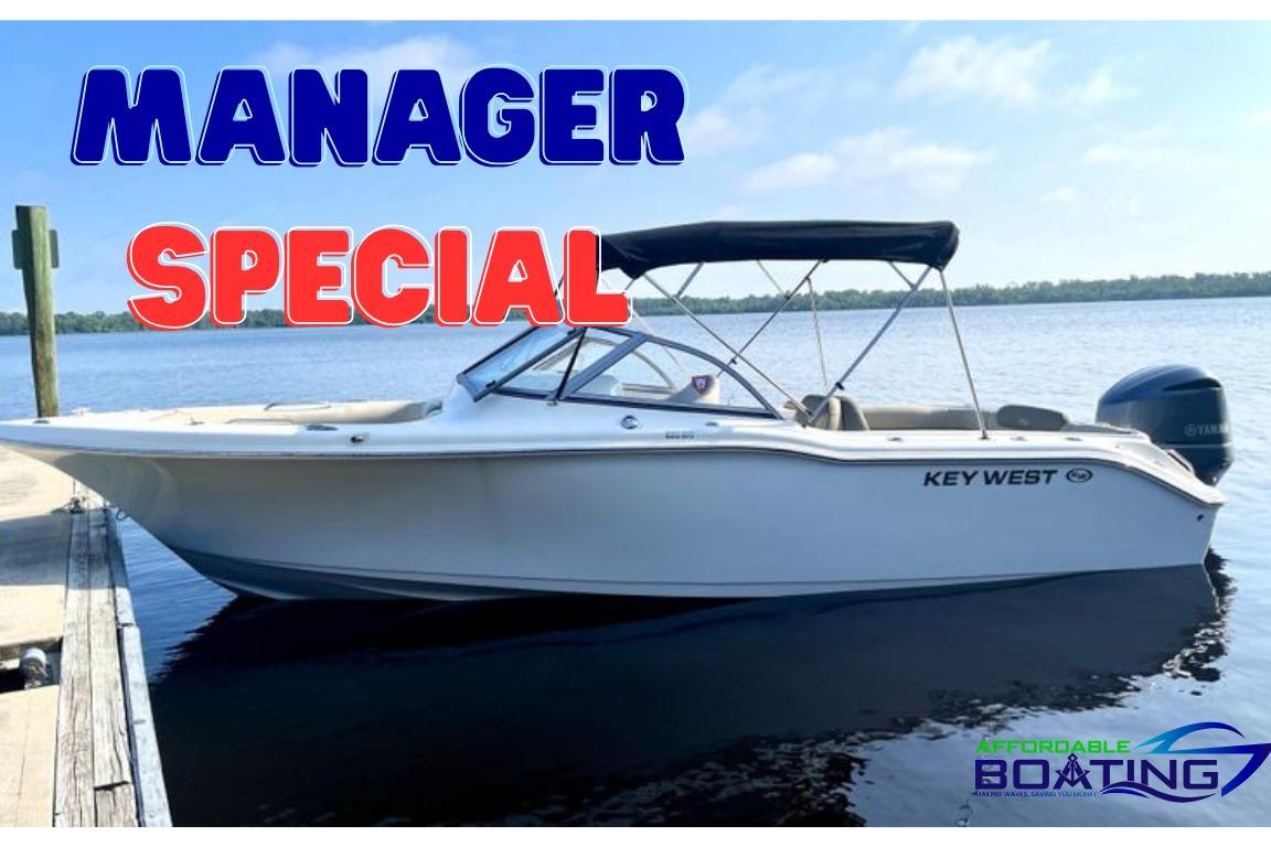 Key West 239 DFS 2022 Key West 239 DFS boat on water, "Manager Special" offer, Affordable Boating logo.