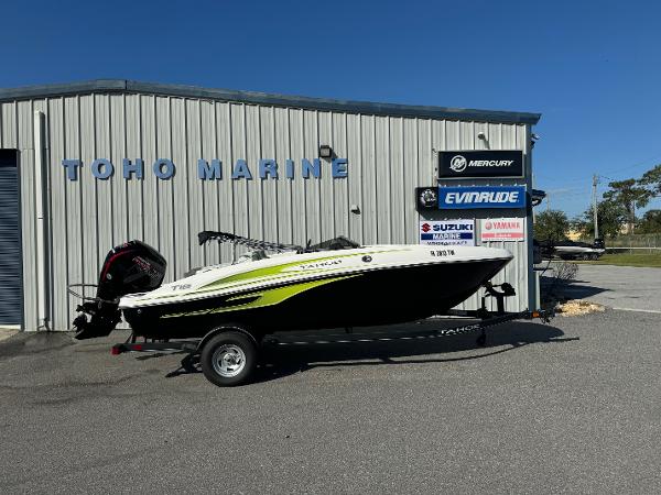 Tahoe T18 C 2024 Tahoe TAHT 18 boat at Toho Marine dealership, parked outside.