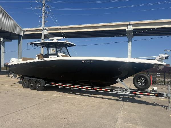 Fountain 38CC LS 2018 Fountain 38CC LS boat on trailer under clear blue sky.