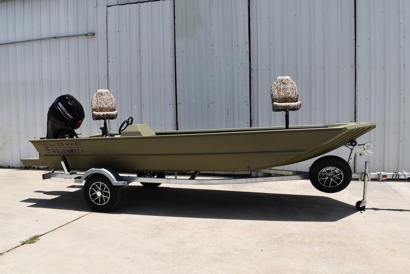 Lowe RX1860 RAMBLER 2025 Lowe RX1860 RAMBLER boat on trailer, parked outdoors.
