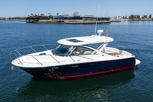 Tiara Yachts 3100 Coronet 2018 Tiara Yachts 3100 Coronet cruising on calm waters, showcasing sleek design and luxury features.