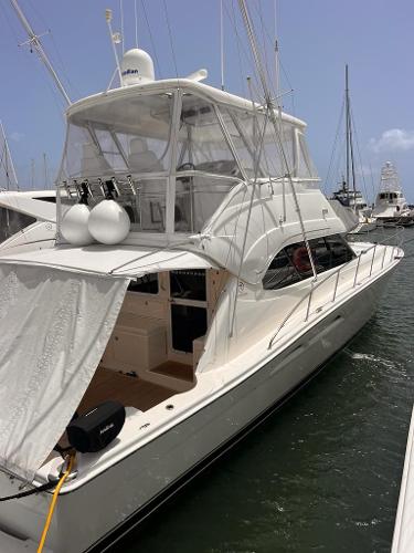 Riviera 51 Flybridge 2005 Riviera 51 Flybridge yacht docked at marina.