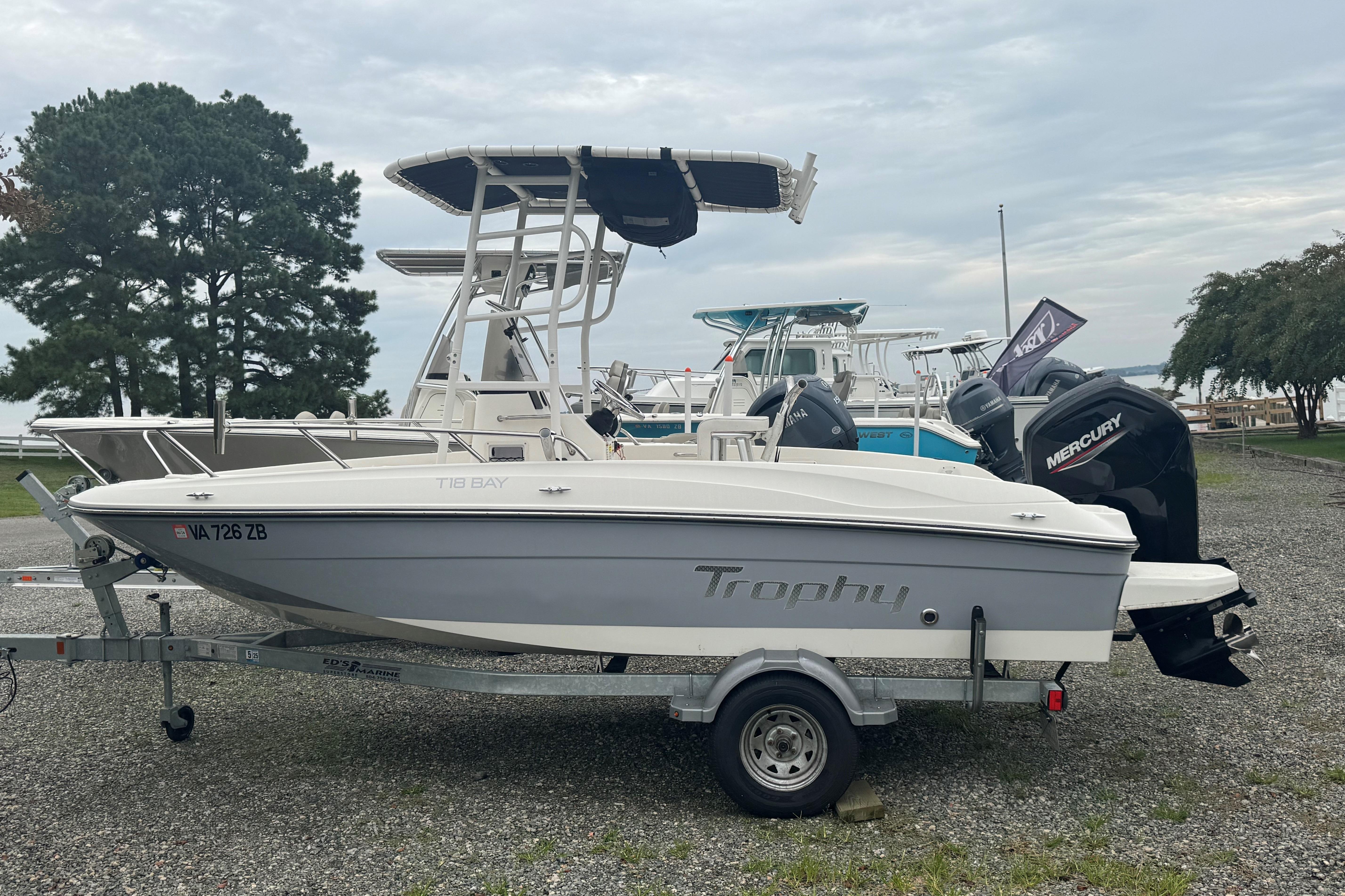 Bayliner Trophy T18Bay 2023 Bayliner Trophy T18Bay boat on trailer with Mercury outboard motor.