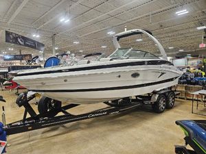 Crownline 260 SS 2025 Crownline 260SS boat displayed indoors on a trailer.