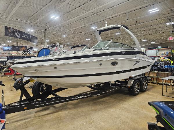 Crownline 260SS 2025 Crownline 260SS boat displayed indoors on a trailer.