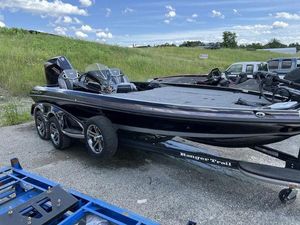 Ranger Z521R Ranger Cup Equipped 2024 Ranger Z521R Ranger Cup Equipped boat on a trailer in a parking lot.