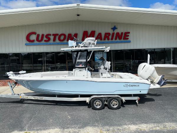 Crevalle 26 Open 2018 Crevalle 26 Open boat on trailer at Custom Marine dealership.