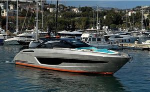 Riva 68 Diable 2024 Riva 68 Diable luxury yacht docked in a marina, surrounded by other boats.