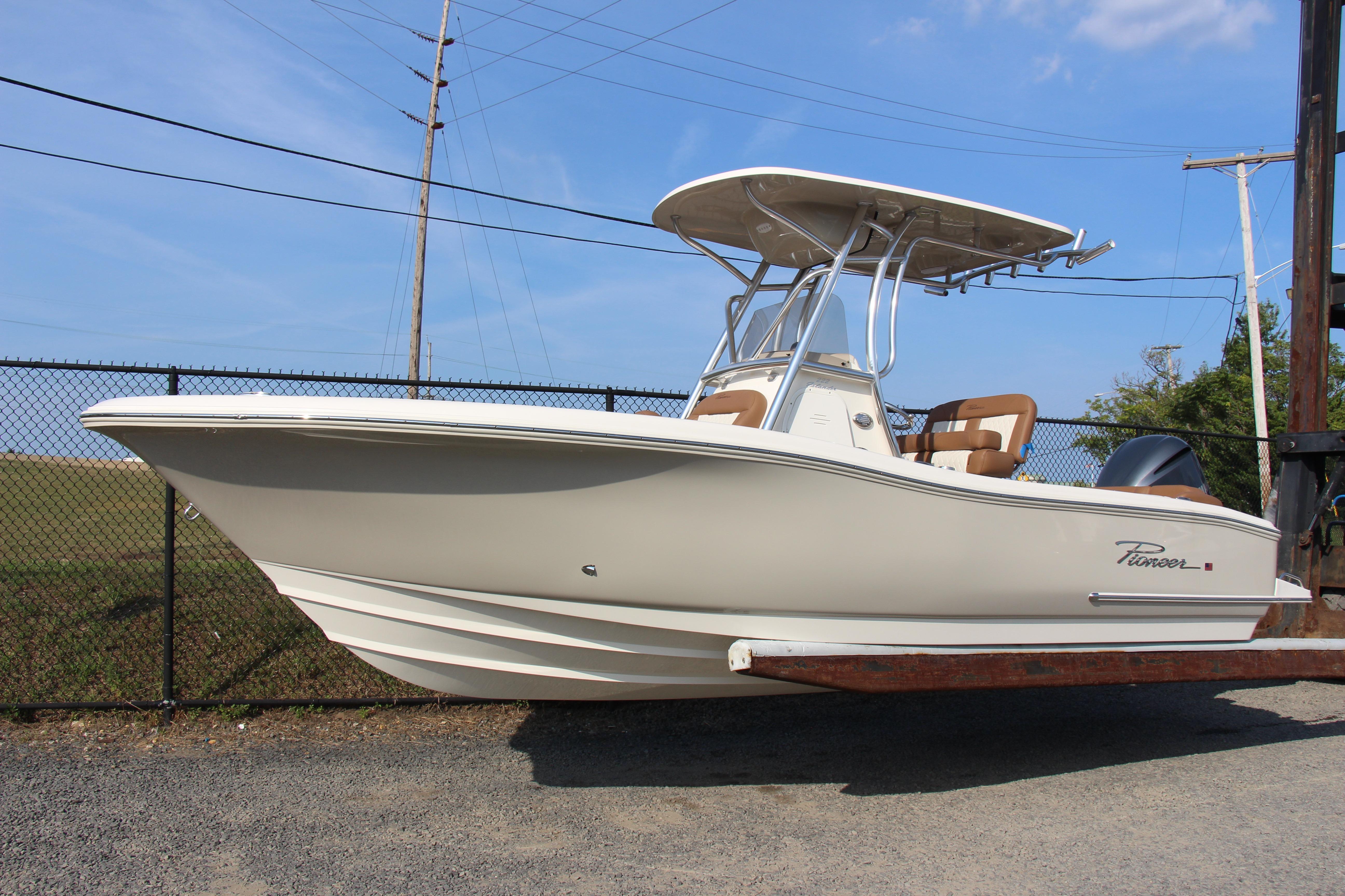 Pioneer 222 Islander 2025 Pioneer 222 Islander boat on display, featuring sleek design and modern amenities.