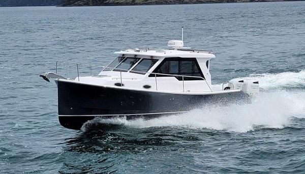True North 34 2024 True North 34 boat cruising on open water.