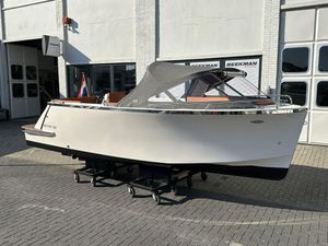 Lifestyle 600 Tender 2023 Lifestyle 600 Tender boat displayed outdoors on a wheeled platform.