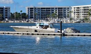 HCB 53 Suenos RXV 2024 HCB 53 Suenos RXV boat docked near waterfront buildings.