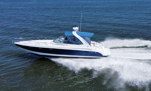 Formula 370 Super Sport 2004 Formula 370 Super Sport speedboat cruising on open water.
