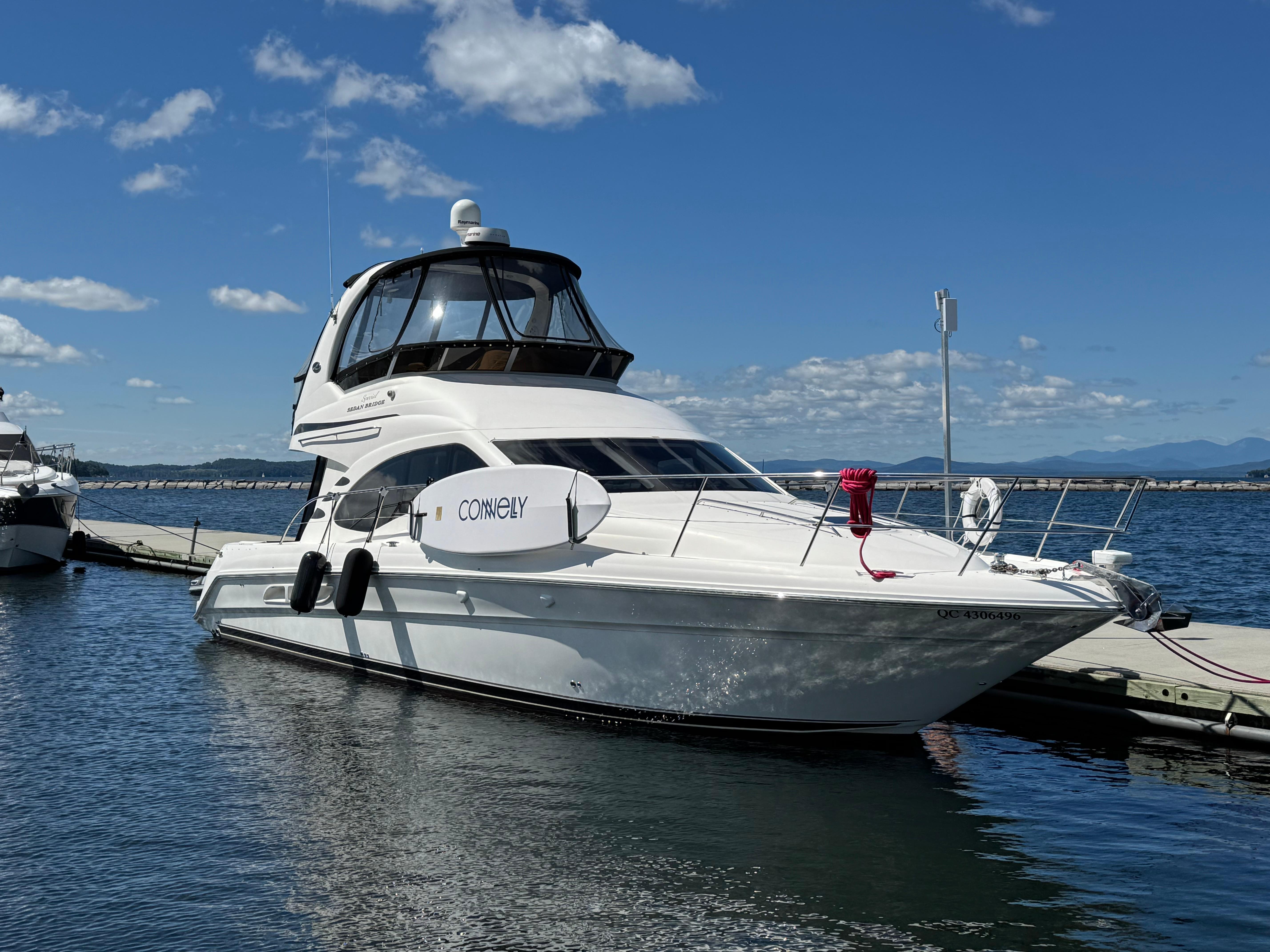 Sea Ray 420 Sedan Bridge 2005 Sea Ray 420 Sedan Bridge yacht docked on a sunny day.