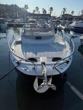 Quicksilver Activ 675 Open 2018 Quicksilver Activ 675 Open boat docked in a marina, surrounded by other boats.