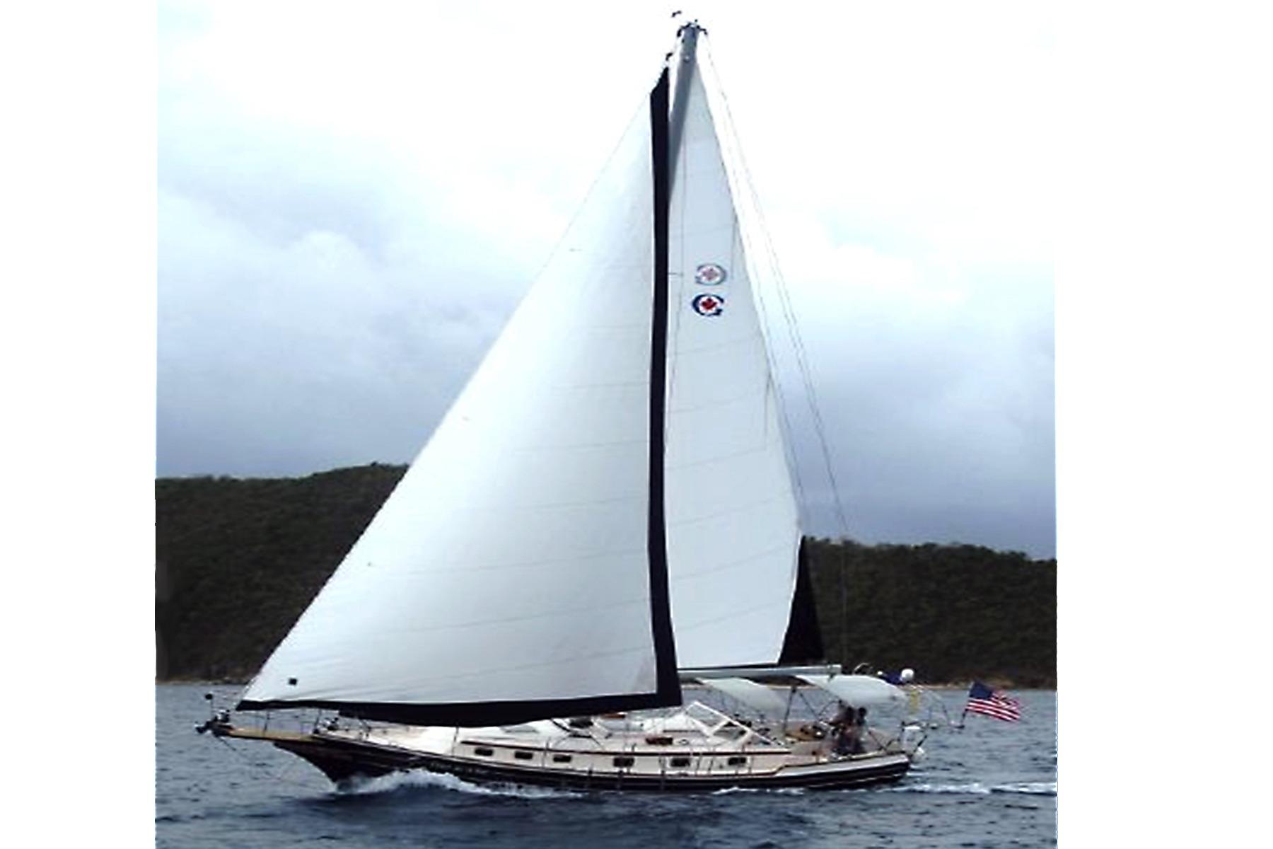 Gozzard 41B Sailing yacht Gozzard 41B, 2008 model, cruising on open water with full sails.
