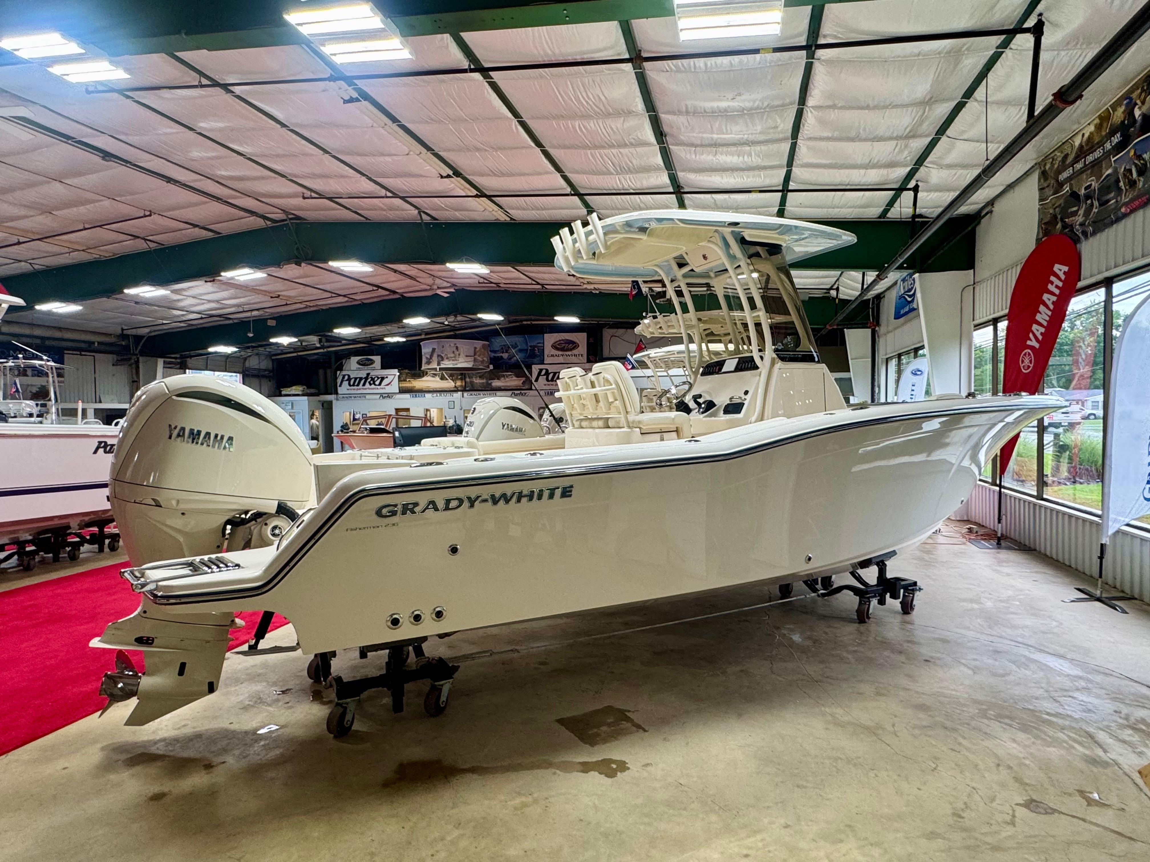 Grady-White Fisherman 236 2025 Grady-White Fisherman 236 boat in showroom with Yamaha engines.