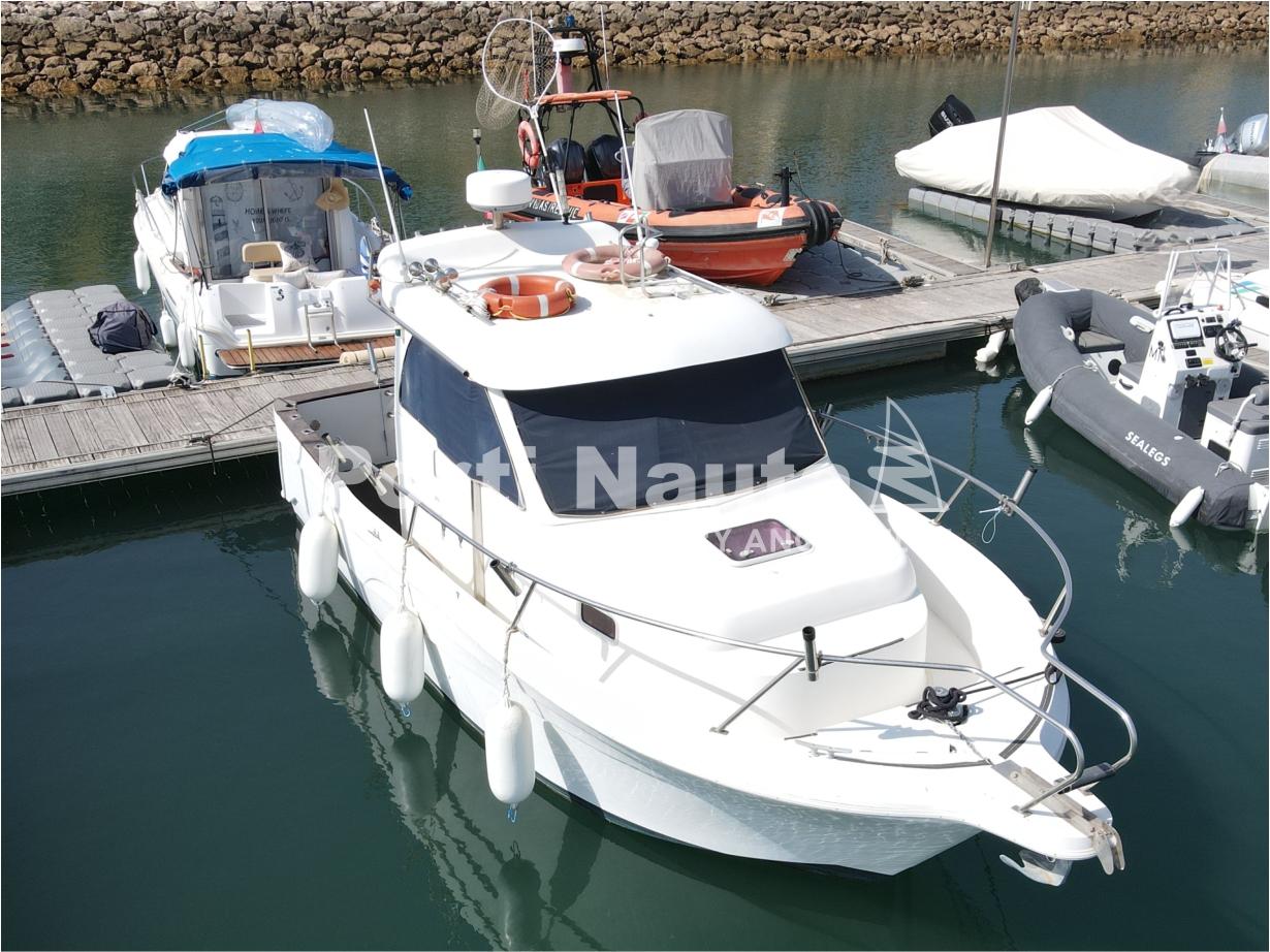 Starfisher ST 840 WA 2004 Starfisher ST 840 WA boat docked in marina, surrounded by other vessels.