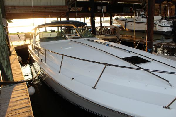 Sea Ray 400 Express Cruiser 1993 Sea Ray 400 Express Cruiser docked at sunset.