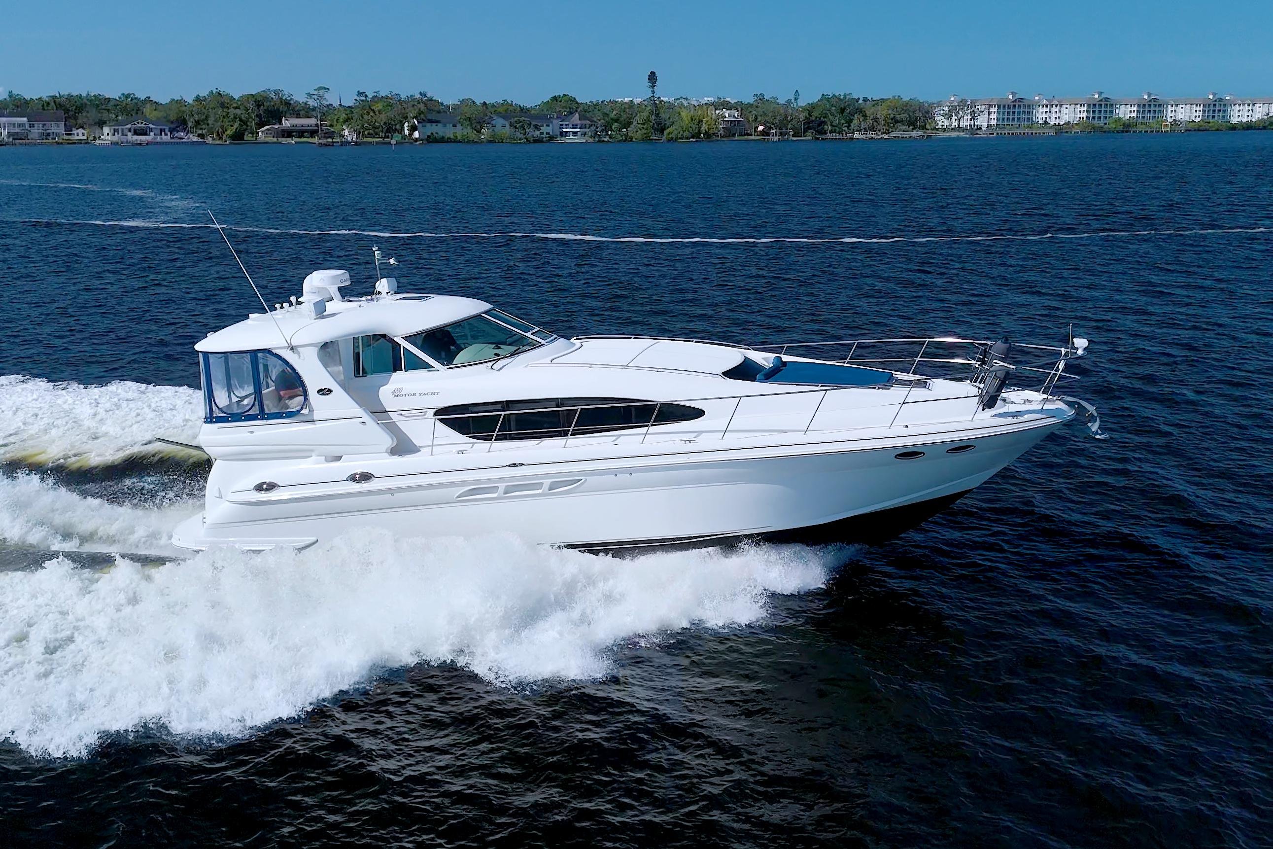 Sea Ray 480 Motor Yacht 2003 Sea Ray 480 Motor Yacht cruising on open water, creating a wake.