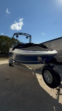 Bayliner VR5 Bowrider I/O 2018 Bayliner VR5 Bowrider I/O on trailer under clear blue sky.