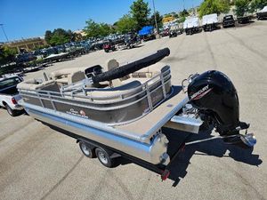 Sun Tracker Party Barge 24 DLX 2024 Sun Tracker Party Barge 24 DLX pontoon boat with Mercury outboard motor.