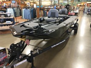 Tracker Panfish 17 2025 Tracker Panfish 17 boat displayed in a store, featuring Minn Kota trolling motor.