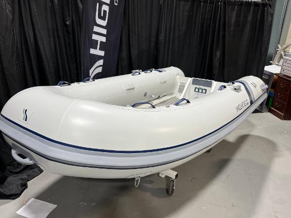 Highfield Ultralite 310 2025 Highfield Ultralite 310 inflatable boat displayed indoors on a stand.
