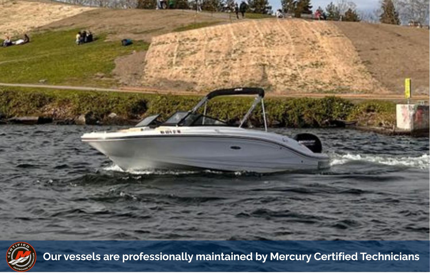 Sea Ray SPX 210 Outboard 2021 Sea Ray SPX 210 Outboard boat cruising on a lake, maintained by Mercury Certified Technicians.