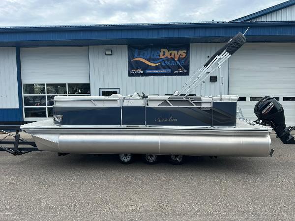 Avalon Venture 2024 Avalon Venture pontoon boat parked at Lake Days Marine dealership.