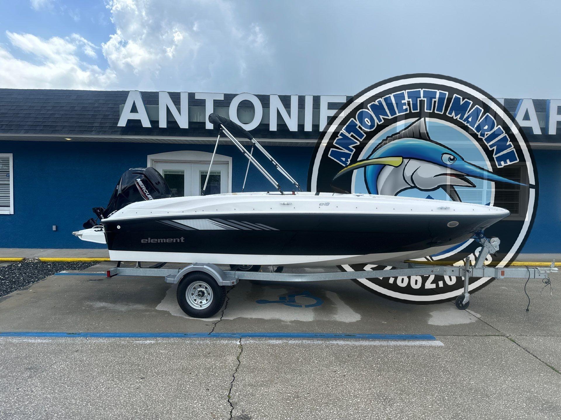 Bayliner E18 2025 Bayliner E18 boat on trailer at Antonetti Marine dealership.