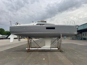 Beneteau Oceanis 30.1 2024 Beneteau Oceanis 30.1 sailboat on display, gray hull, overcast sky.