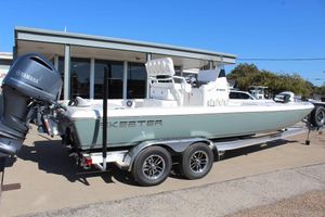 Skeeter SX241 2026 Skeeter SX241 boat with Yamaha engine on trailer, parked outdoors.