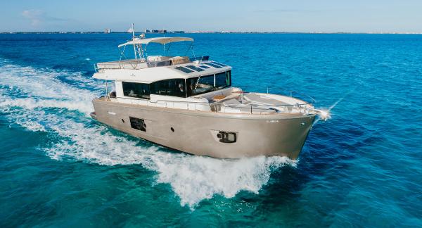 Cranchi Eco Trawler 53 Long Distance 2017 Cranchi Eco Trawler 53 Long Distance cruising on clear blue water.