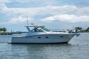 Tiara Yachts 3200 Open 2008 Tiara Yachts 3200 Open cruising on a calm, scenic waterway.