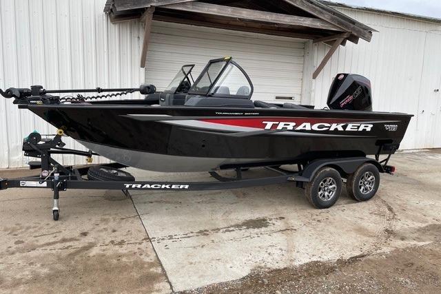 Tracker Targa V-18 Combo 2026 Tracker Targa V-18 Combo boat on trailer, black with red accents.