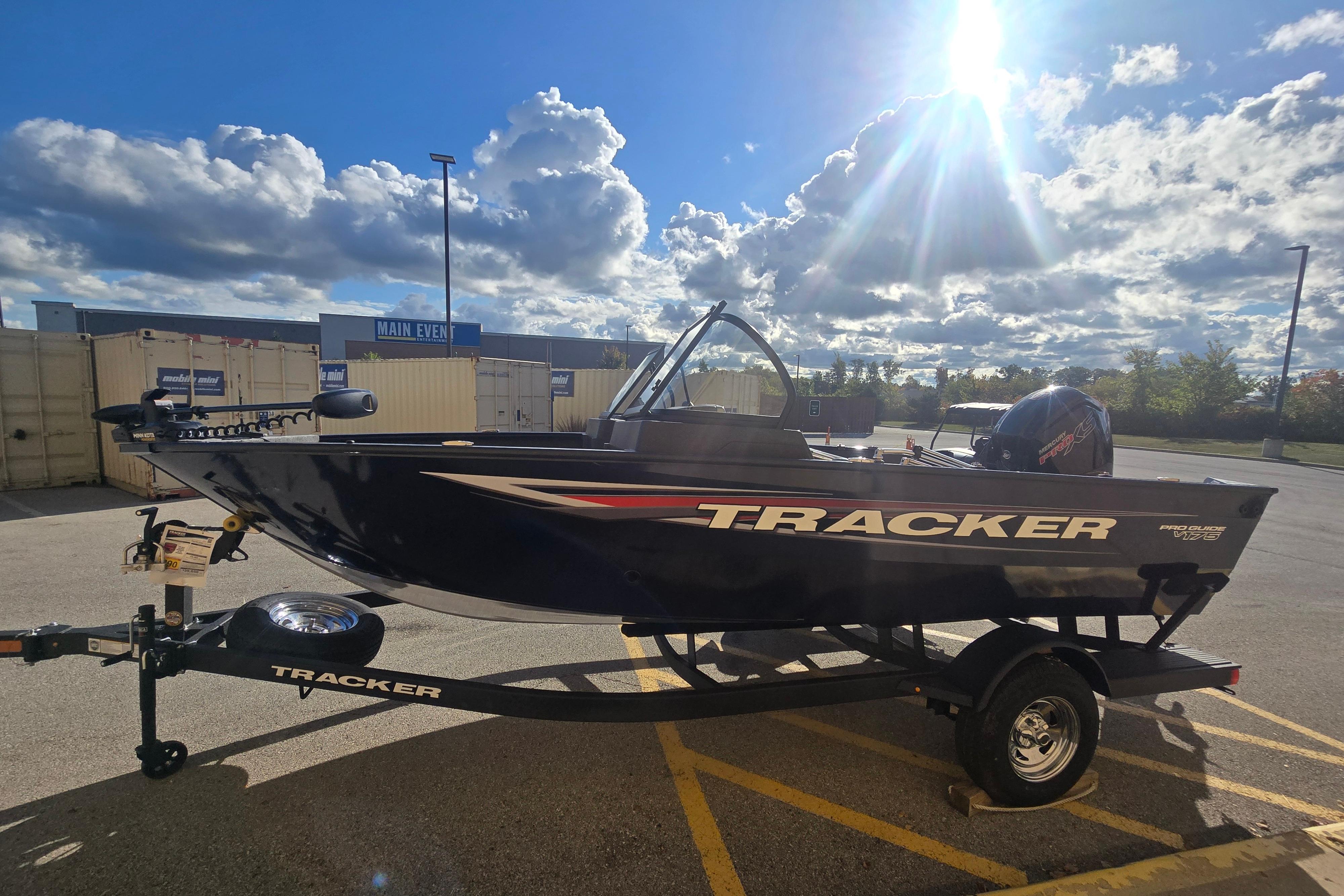 Tracker Pro Guide V-175 WT 2026 Tracker Pro Guide V-175 WT boat on trailer under sunny sky.