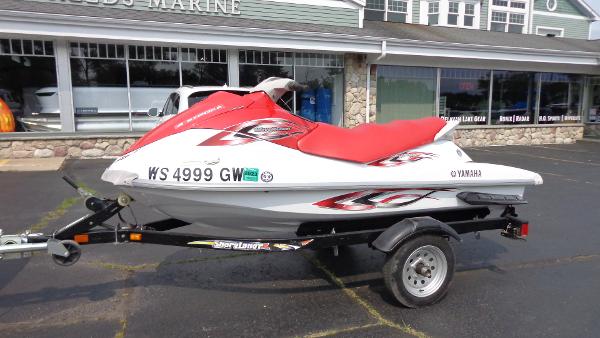 Yamaha WaveRunner VX 110 Sport 2005 Yamaha WaveRunner VX 110 Sport on trailer outside marine shop.