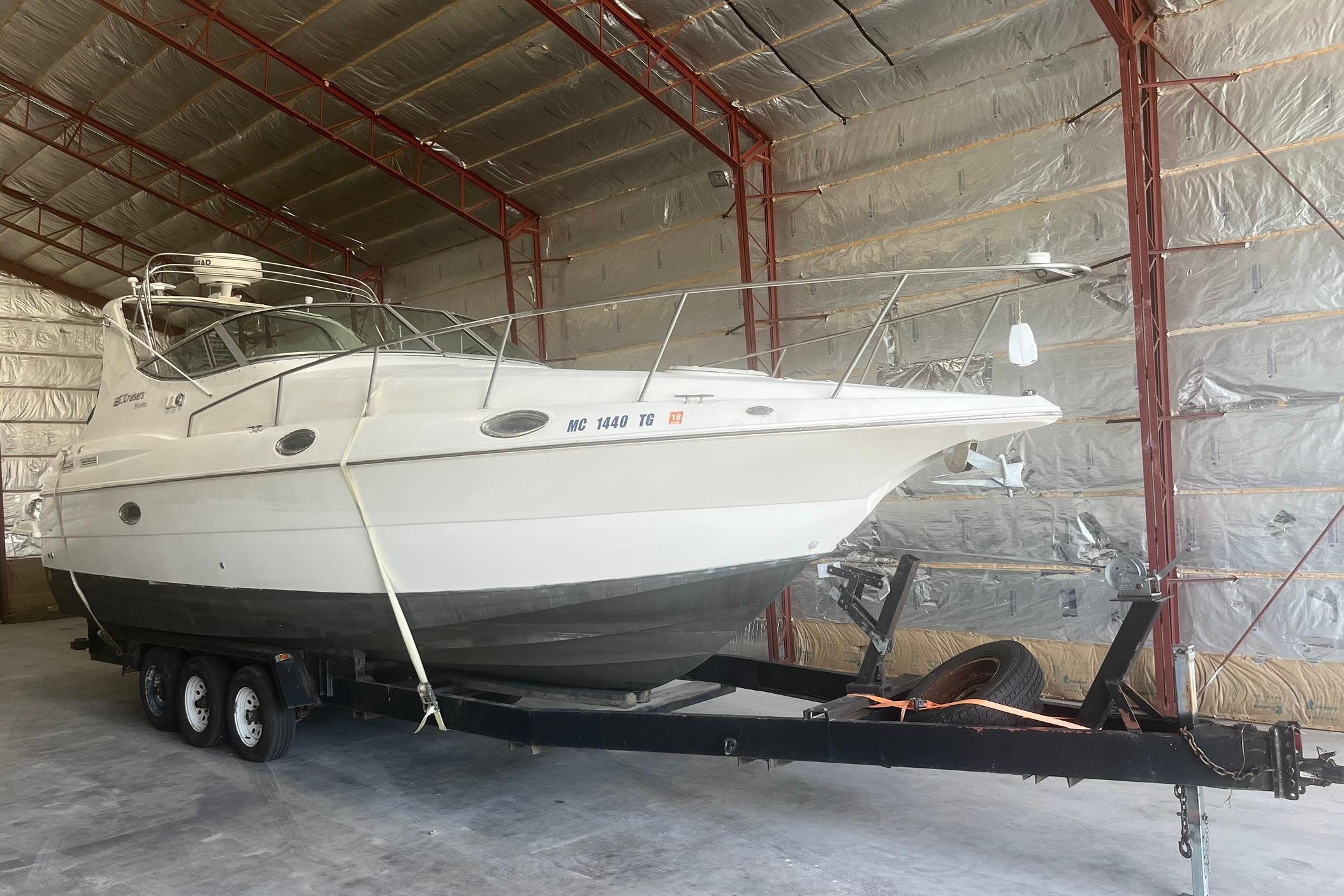 Cruisers Yachts 3075 Rogue 1997 Cruisers Yachts 3075 Rogue boat on trailer in storage facility.