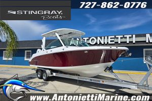 Stingray 259DC Dual Console 2026 Stingray 259DC boat on trailer at Antonietti Marine dealership.