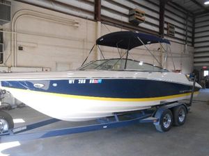 Regal 2200 LSR 2006 Regal 2200SLR boat on trailer in indoor storage facility.